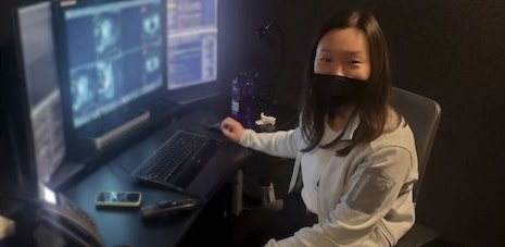 Dr. Karen Cheng at a computer