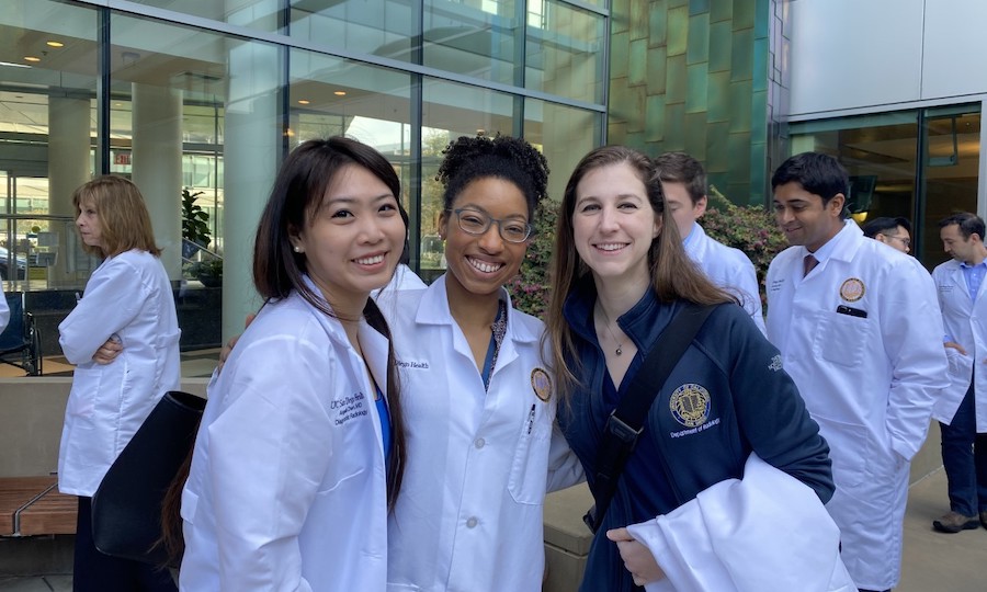 picture day with 3 smiling residents